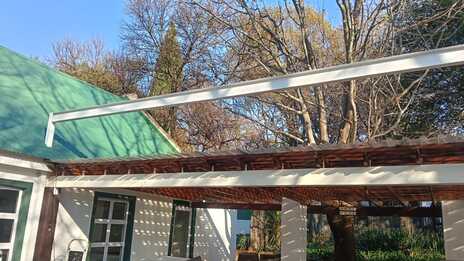 Large-span engineering maximises usable space beneath the awning.