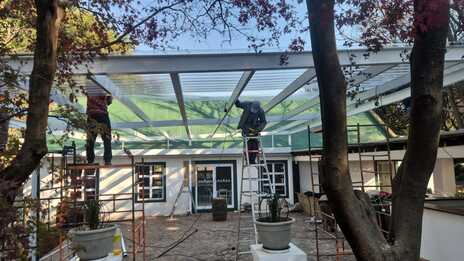 Clear IBR roofing provides year-round weather protection while maintaining natural daylight.